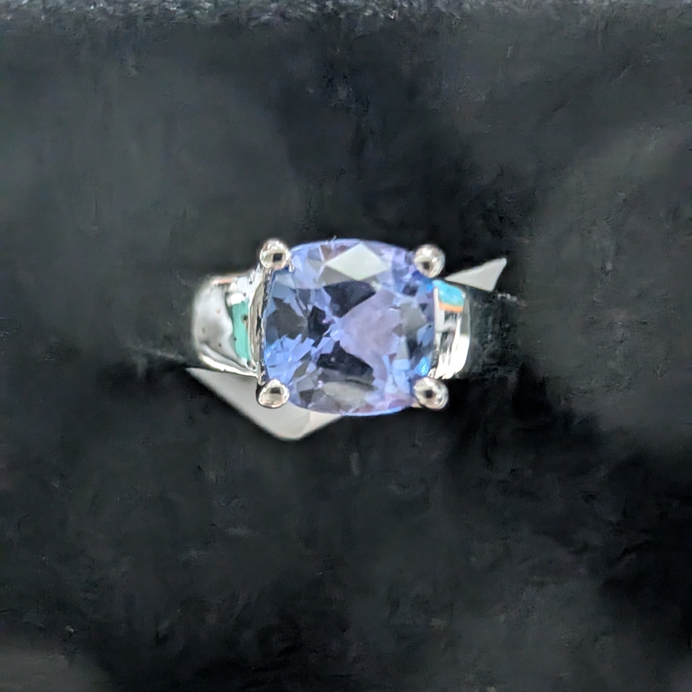 Elegant Silver Ring with Purple Gemstone